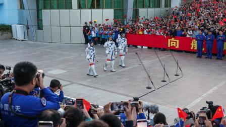 Astronauts Zhu Yangzhu, Zhang Zhiyuan, and Lai Ka-ying, who is the first astronaut from Hong Kong, wave during a see-off ceremony before taking part in the Shenzhou-23Â spaceflight mission toÂ China's TiangongÂ spaceÂ station, atÂ JiuquanÂ SatelliteÂ LaunchÂ Center, nearÂ Jiuquan, Gansu province,Â China, May 24, 2026. REUTERS/Maxim Shemetov