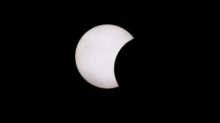 The moon partially covers the sun during a solar eclipse, as seen from A Coruna, Spain, August 12, 2026. REUTERS/Miguel Vidal